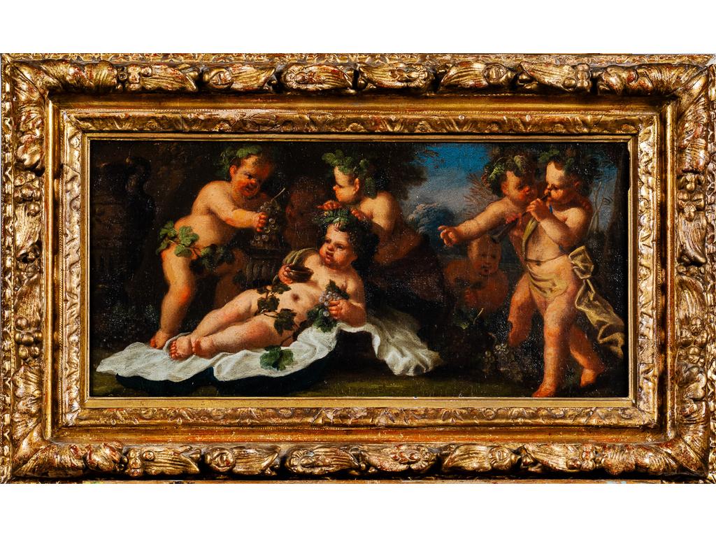 Ecole Française du XVIIIème siècle dans le goût de POUSSIN : les petits bacchus. Huile sur toile dans un joli cadre en bois et stuc doré en partie d'époque. (Rentoilage et restaurations). Dim : 23 x 47.5 cm