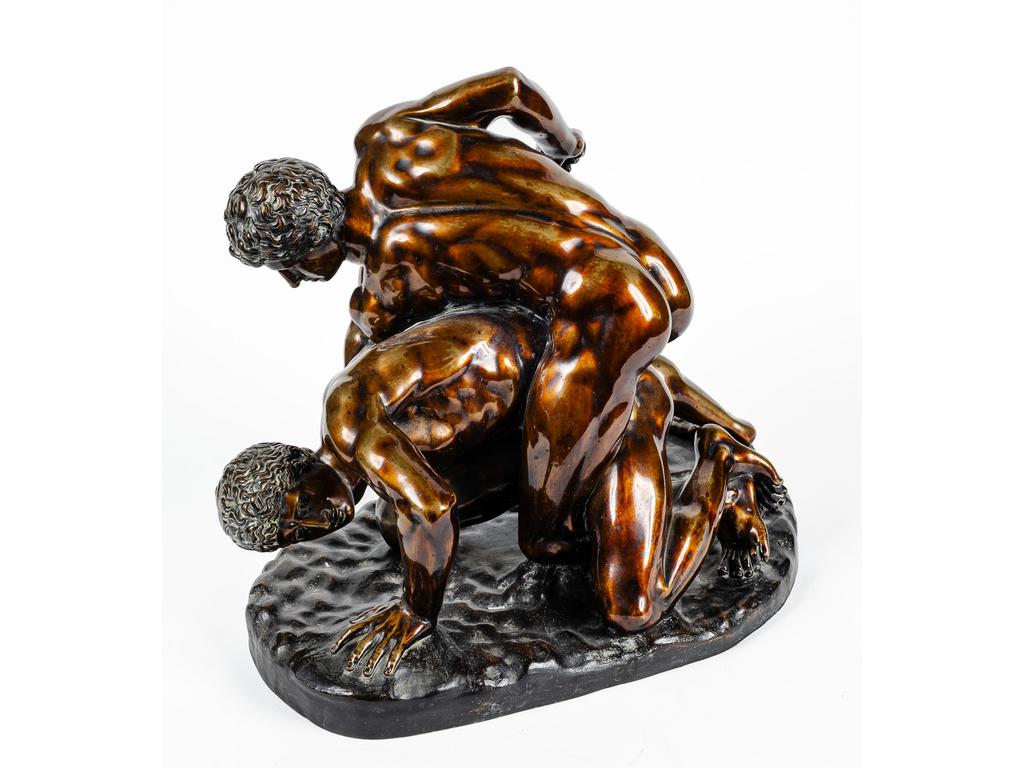 (D'après) Philippe MAGNER : Les lutteurs. Groupe en bronze patiné et vernis. Fonte d'édition de la société des bronzes. Dim : 39 x 47 x 28 cm.
