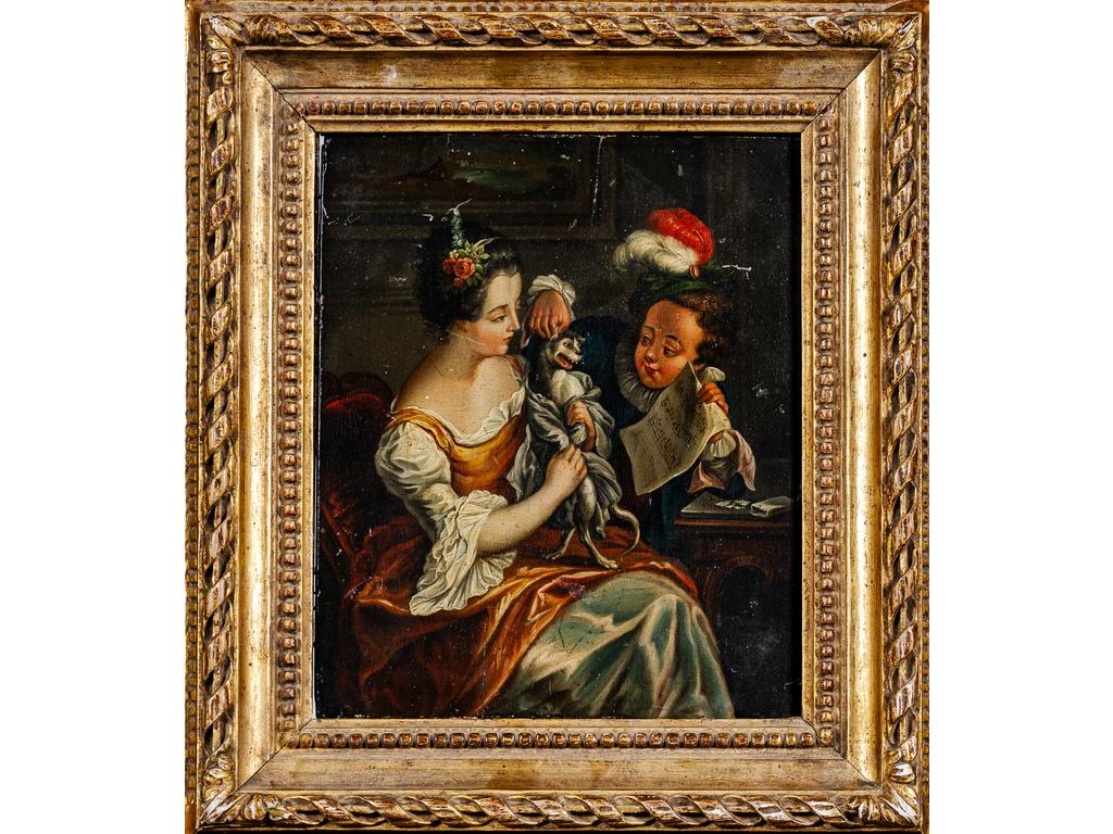 Ecole Française du XIXème siècle : La leçon de solfège donné au chat. Huile sur panneau, dans un joli cadre en bois sculpté et doré d'époque Louis XVI. Dim : 21.5 x 17.5 cm.