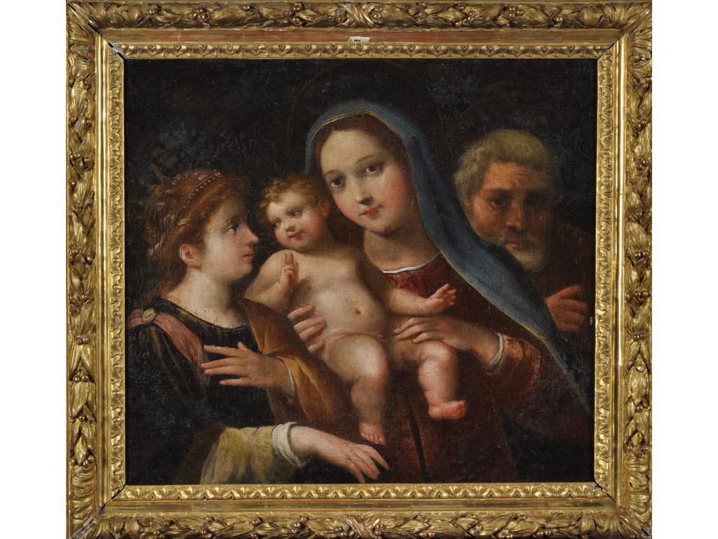 Ecole Italienne du XVIIème siècle : Sainte Catherine et la Sainte Famille. Toile. Cadre à décor de feuilles de laurier en bois sculpté. (Châssis changé et rentoilage). Dim : 54.5 x 61.5 cm