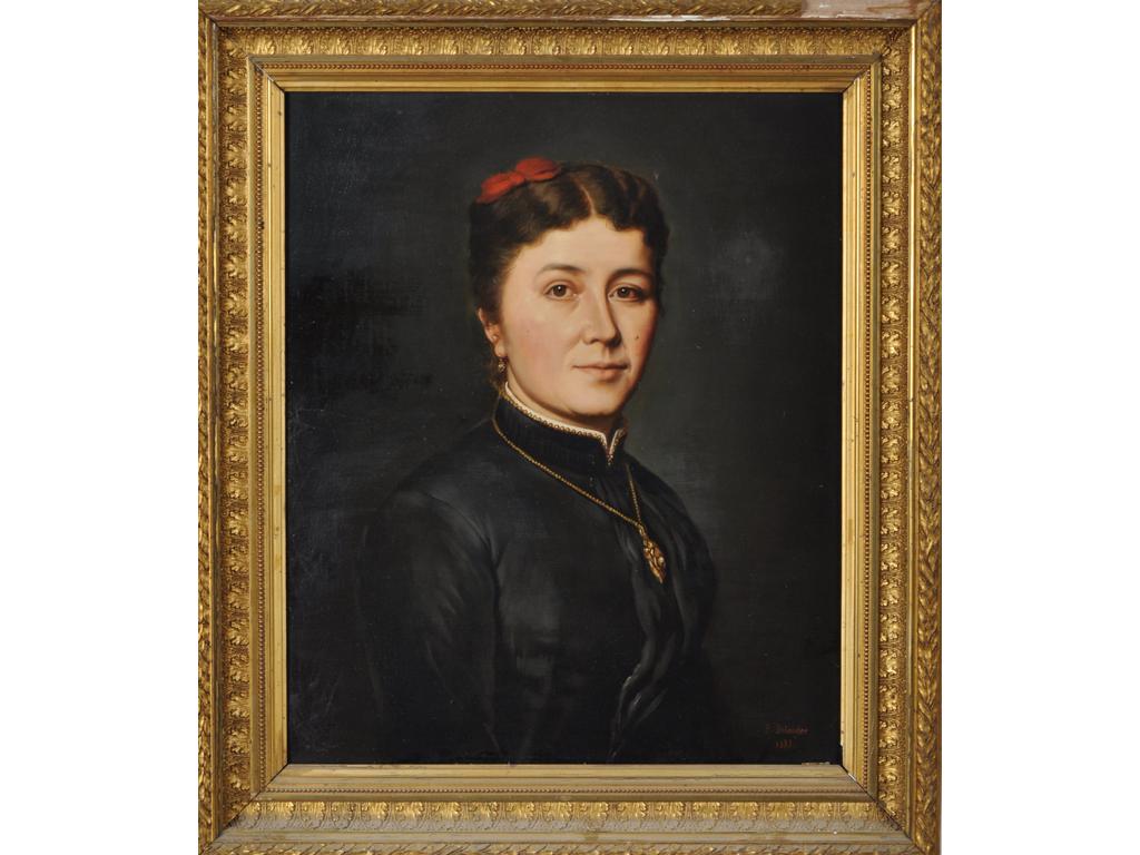 E. DETANGER (XIXème siècle) : Portrait de femme au noeud rouge. Huile sur toile signée en bas à droite et datée 1888. (restaurations). Dim : 61 x 50 cm.