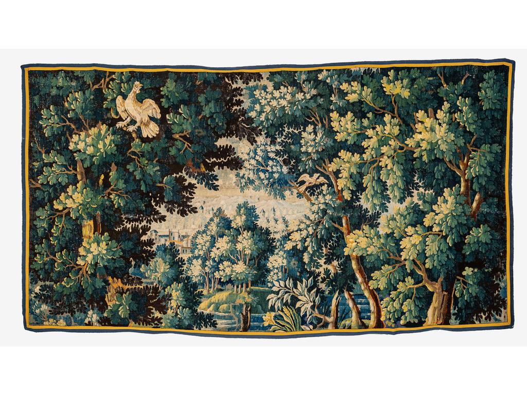 AUBUSSON : Grand fragment de tapisserie en laine à décor d'une verdure, au centre des châteaux. Epoque XVIIIème siècle. Dim : 157 x 286 cm.