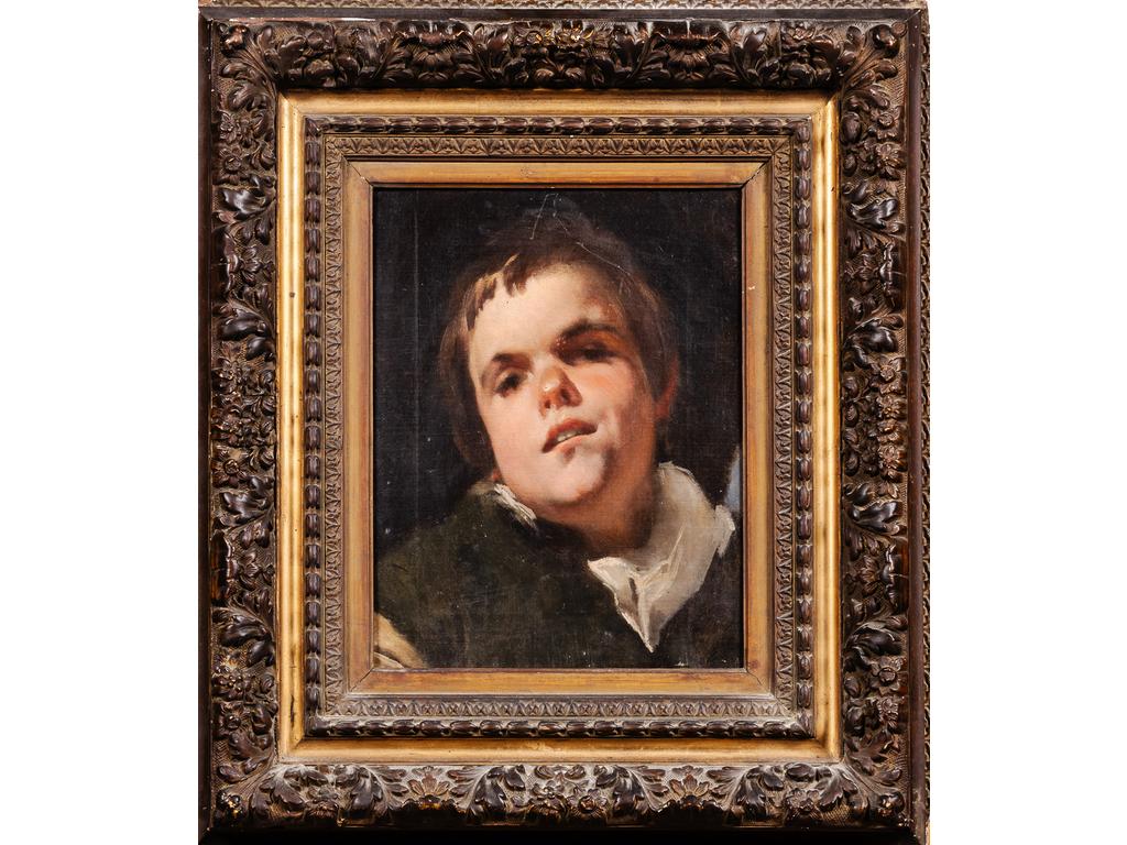 Ecole du XIXème siècle : Portrait d'un enfant. Huile sur toile. Porte au dos une signature de 