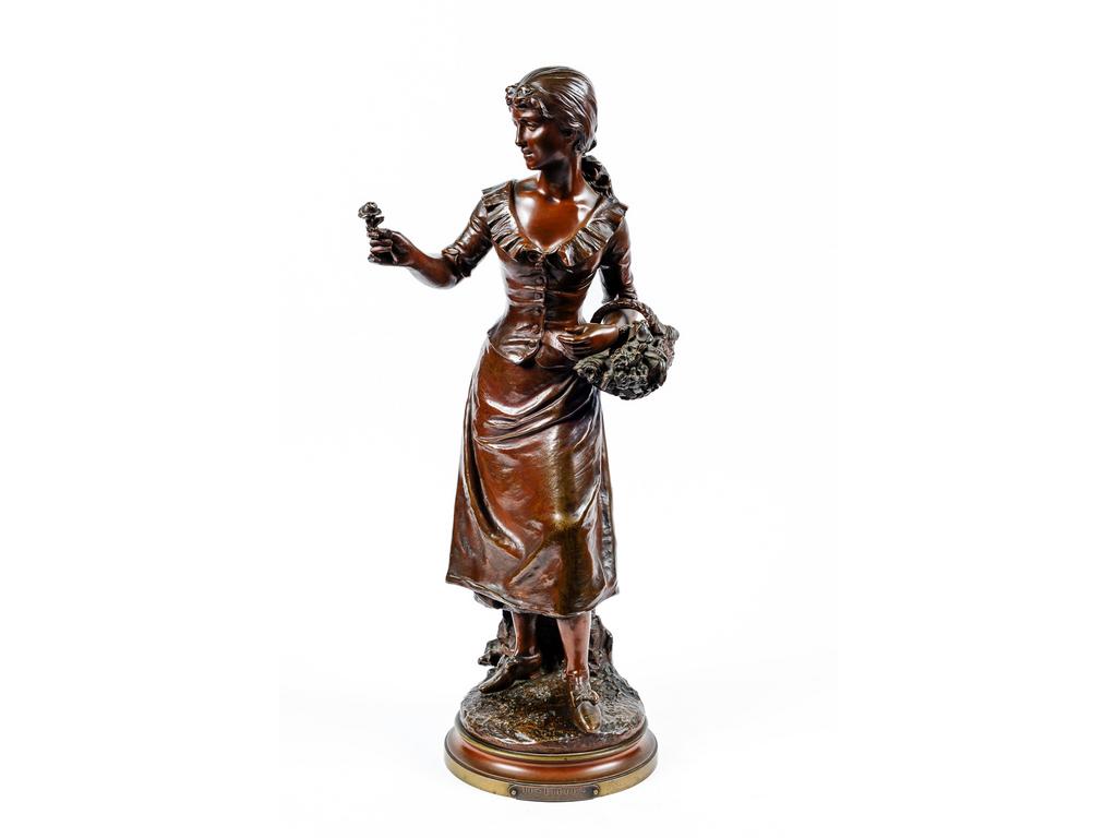 Henryk KOSSOWSKI (1855-1921) : Les fleurs. Bronze à patine brune signé sur la terrasse. Edité par la société des bronzes de Paris. Haut : 66 cm
