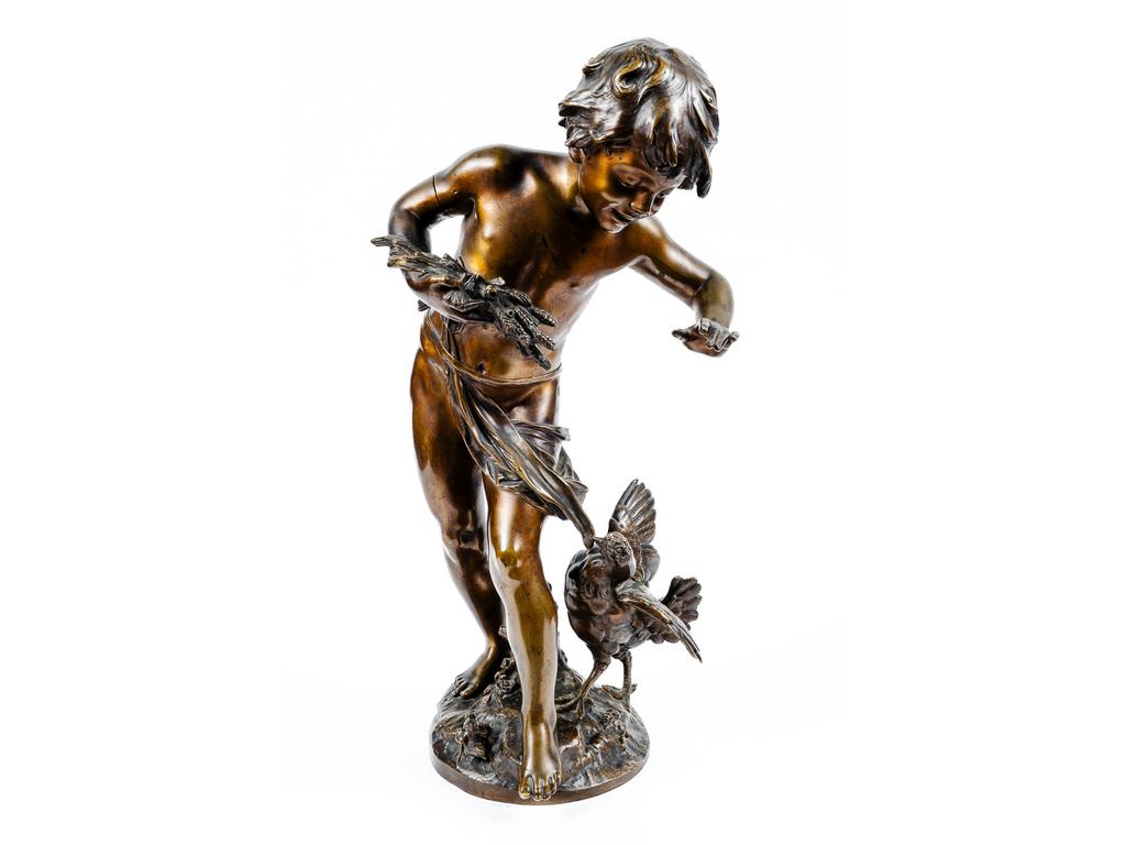 Auguste MOREAU (1834-1917) : Jeune garçon au coq. Bronze à patine médaille signé sur la terrasse (petit défaut au bras). Haut : 50 cm