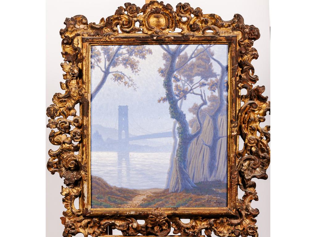 F.E LAHAYE : Paysage symboliste au pont. Huile sur toile signée en bas à droite. Dans un beau cadre ancien en bois sculpté. Dim : 76 x 66 cm.