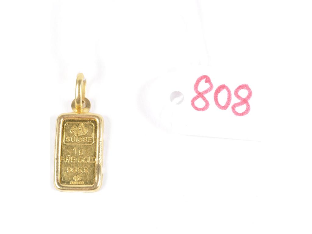 Pendentif orné dun petit lingotin de 1g à 999.9 millièmes sur or jaune ( AC). PB: 2g