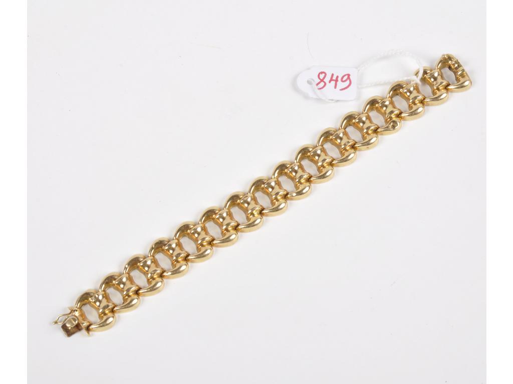 Bracelet à maillons ouvragés et en or jaune ( AC). Déformations. Larg: 18 mm. Long : 18 cm. PB: 22.3g