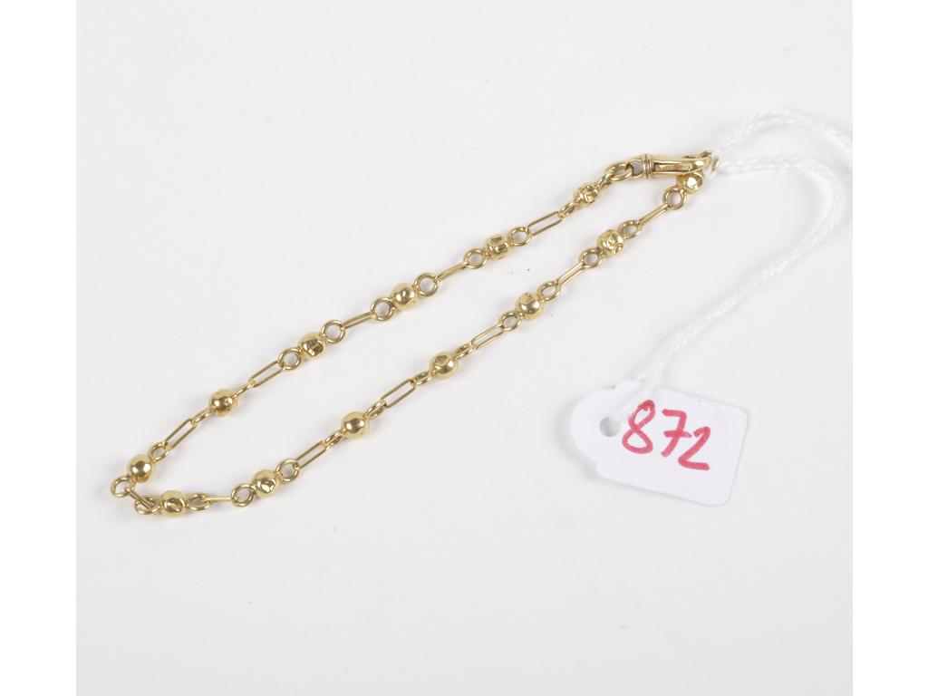 Bracelet usé avec des boules et des maillons longs en or jaune (AC). Déformations. PB: 4.8g