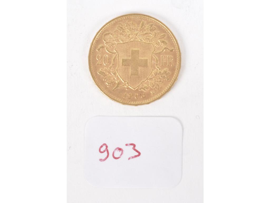 1 Pièce de 20 F Suisse or. Poids : 6,5g.