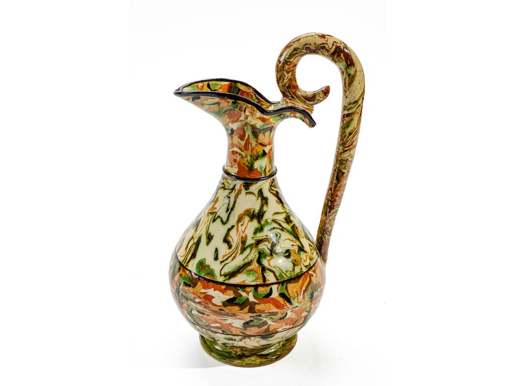 Manufacture PICHON à Uzès : Pichet en céramique à décor marbré en terres mêlées. Signé du cachet de François PICHON. Hauteur : 30 cm. (Anse cassée, recollée)