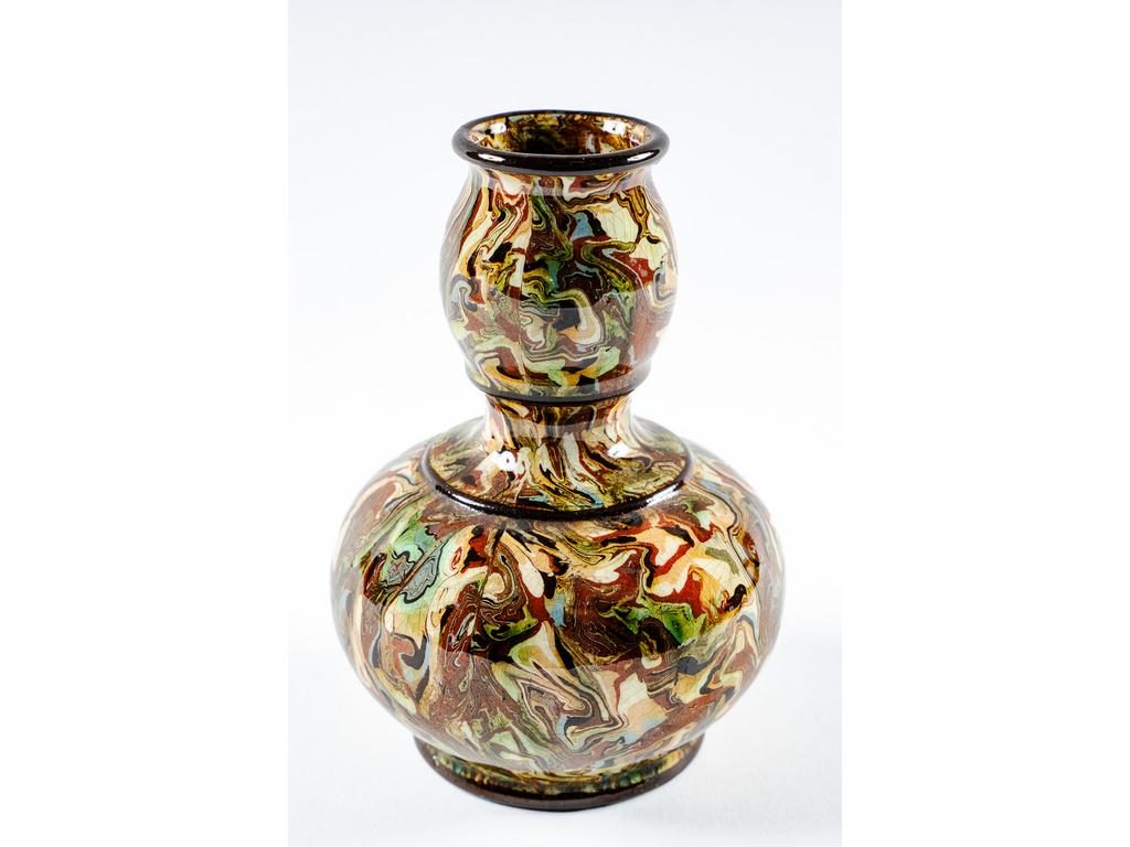 Manufacture PICHON à Uzès : Petit vase à col bagué à décor marbré en terres mêlées. Hauteur : 15 cm.