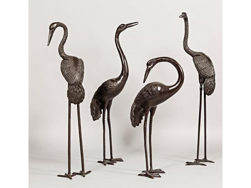 Quatre grues en bronze à patine noire.  Travail contemporain.  H