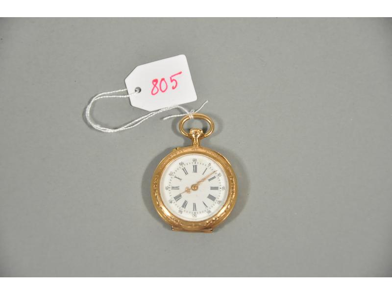 Une montre de col en or jaune, à remontoir. Cuvette en or. Diamè