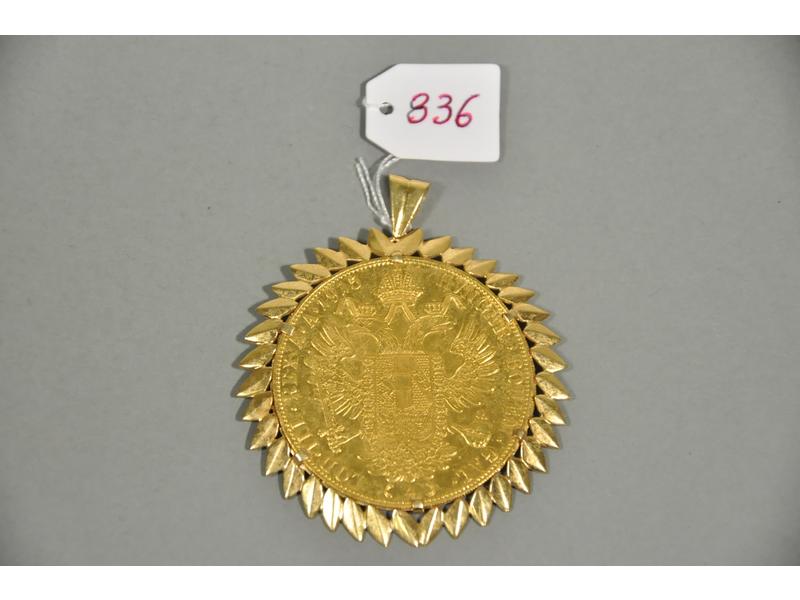 Un pendentif pièce en or. Diamètre: 5 cm. Poids: 21g20