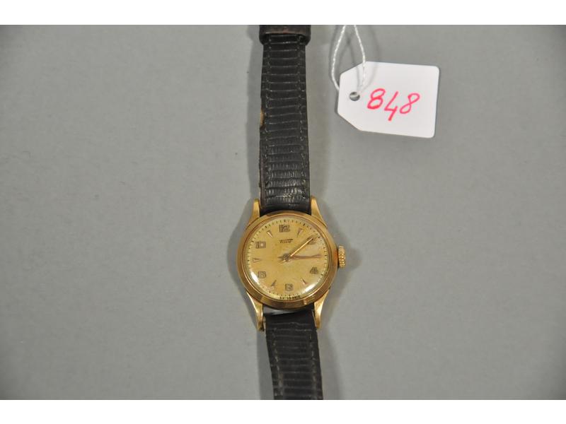 TISSOT: Montre de dame en or, boitier rond, cadran doré (quelque