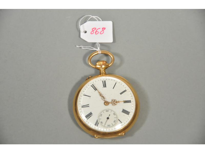 Une montre de poche en or à remontoir. Cadran email blanc. Cuvet