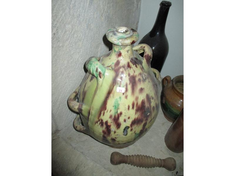 Gourde en terre cuite vernissée XIX°. Haut: 41cm