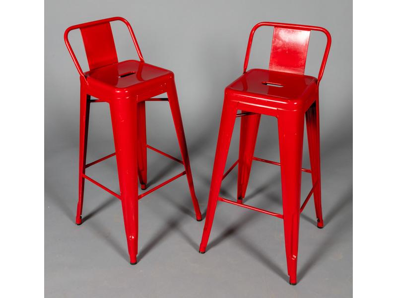 TOLIX : Paire de tabourets de bar en fer rouge laqué.