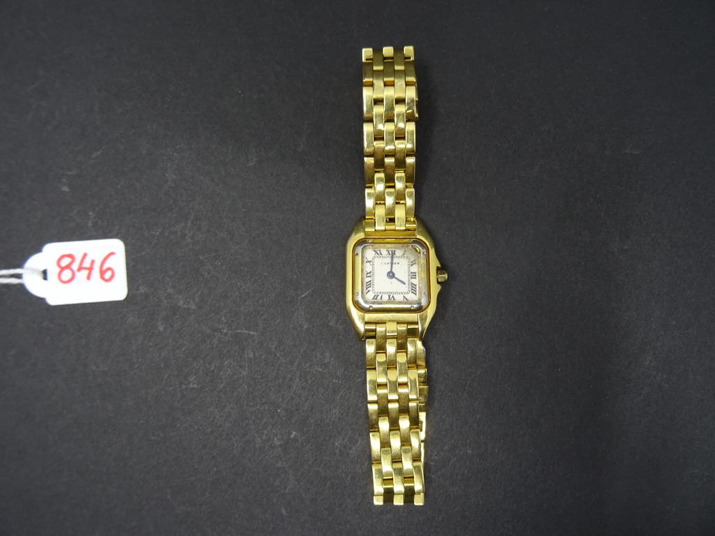 CARTIER : Montre en métal doré, modèle SANTOS. (Mauvais état).
