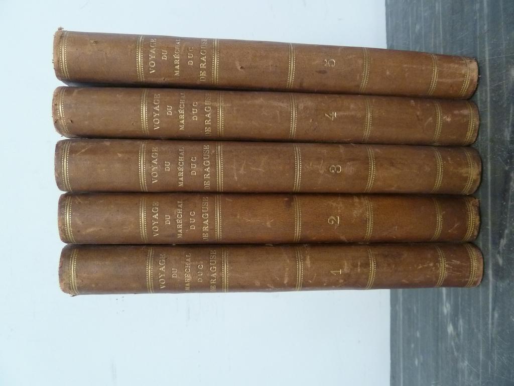 RAGUSE, Duc de : Voyage du Maréchal Duc de Raguse en Hongrie, en Transylvanie, dans la Russie Méridionale, en Crimée, et sur les bords de la mer d'Azoff, à Constantinople, dans quelques parties de l'Asie-Mineure, en Syrie, en Palestine et en Egypte  en Sicile. Paris : Chez Ladvocat, 1837-1838. 5 volumes in-8°. Reliures 2ième du XIXe siècle demi-basane lie de vin, dos lisses ornés de filets dorés en place des nerfs. Les gravures et cartes sont absentes. Dos éclaircis, quelques frottis et rousseur. PEU COMMUN.