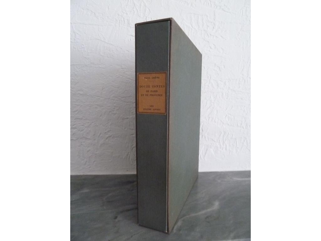 ARENE, Paul. (LELEE, Léo) : Douze contes de Paris et de Provence. Paris : Les quatre livres, 1930. Un volume in-4° en feuilles sous couvertures imprimées et rempliées. Chemise titrée au dos et étuis cartonnés de léditeur. Illustré de 50 lithographies originales en couleurs et de 12 lettrines de Léo LELEE. Tiré à 150 ex. numérotés. 1 des 40 sur Japon impérial comprenant en plus de létat définitif des lithographies, un croquis original en couleurs signé par Léo LELEE (illustration de la page 87), une suite des lithographies (le cul-de-lampe de la page 56 nest pas dans la suite), le tout sur Japon. Il est joint un bulletin de souscription avec la reproduction dune lithographie. TRES BEL EXEMPLAIRE, certainement le plus beau livre illustré par Léo LELEE.