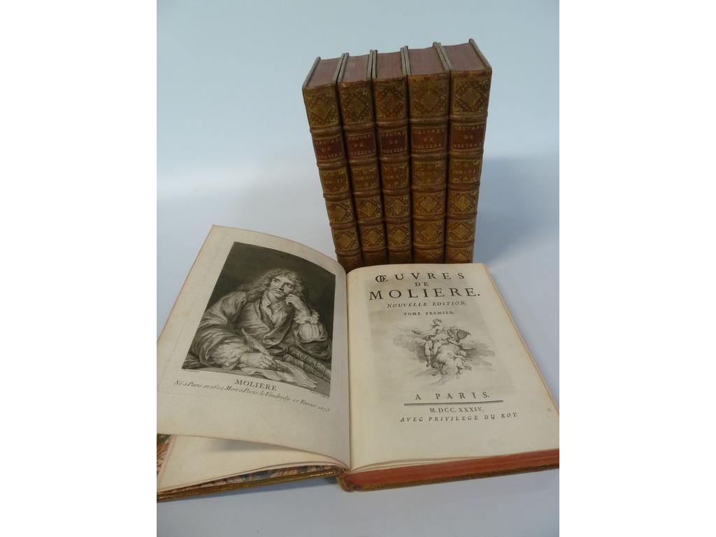 MOLIERE. (BOUCHER, François) : uvres. Paris : S.e. (Prault), 1734. 6 volumes grand in-4°. Reliures de lépoque plein veau havane, dos à nerfs ornés de caissons de double filet doré richement et finement fleuronnés, pièces de titre en maroquin rouge, tomaisons dorées, triple filet doré en encadrement des plats, double filet doré sur coupes, roulette dorée sur toutes tranches rouges. Illustré dun portrait par Coypel gravé par Lépicié, de fleuron sur titre répété, de 33 hors-texte par François BOUCHER gravés par Laurent Cars, de 200 et non 198 (si on ajoute les 2 gravures sur le carton évoqué infra) en-tête, culs-de-lampe et lettrines ornées, dont plusieurs se répètent, par Boucher, Blondel et Oppenord gravées par Joullain et Cars (en réalité il y a avec les répétitions 310 gravures in-texte: 103 en-tête, 103 lettrines et 102 culs-de-lampe + les 2). Exemplaire de 1ère émission avec la faute à « Comteese » au lieu de Comtesse, à la douzième ligne de la page 360 du 6ième volume ? mais avec surtout le rarissime carton du Sicilien (Tome IV) avant les corrections (la différence réside dans le nom dun personnage : Climène est remplacé par Zaide, plus dans len-tête et la lettrine) que Cohen (712) signale sans lavoir vu. De plus, le carton corrigé (2 feuillets), tel quil se trouve dans les exemplaires habituels, a été interfolié, dans ce même tome IV après la page 418. (Lacroix : Bibliographie, n°316 et Lacroix : Iconographie, n° 577). Infimes frottis, une mouillure en marge dun feuillet sans atteinte au texte, quelques feuillets brunis sinon TRES BEL EXEMPLAIRE, grand de marges (287 x 213 mm) possédant un très beau tirage des gravures, avec le fort rare carton du Sicilien. Fraiche reliure strictement contemporaine pour un des livres illustrés les plus célèbres du XVIIIe siècle et le chef-duvre de Boucher comme illustrateur.