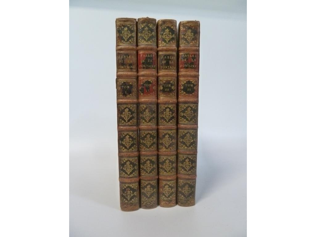 LA FONTAINE. (OUDRY, Jean-Baptiste) : Fables choisies, mises en vers. Paris : Charles-Antoine Jombert pour Desaint   Saillant, Durand, 1755-1759. 4 volumes in-folio. Reliures de lépoque pleine veau havane, dos à nerfs ornés de caissons de double filet doré fleuronnés, pièces de titre et de tomaison en maroquin, roulette de rinceaux dorés en encadrement des plats, toutes tranches dorées. Somptueuse édition illustrée, bien complète de ses 276 planches gravées par Cochin, Fessard, Lemire, Tardieu, Prevost, Chedel, Lempereur... d'après les dessins de Jean-Baptiste OUDRY dont un frontispice d'Oudry, terminé par Dupuis et gravé par Cochin (71+68+68+69). Très nombreux culs-de-lampe gravés sur bois par Le Sueur et Papillon, daprès Bachellier. Exemplaire du 1er TIRAGE sans les mots : « Le Léopard » dans la banderole de la figure de la fable : « Le singe et le Léopard » (Tome III, page 113). De toutes les créations dOudry, ce sont ses 276 dessins illustrant Les Fables qui suscitèrent le plus grand nombre de commentaires et contribuèrent à établir son image. Destinés à l'origine à la manufacture des tapisseries de Beauvais, il s'agissait de dessins à la plume et au pinceau, à lencre noire et au lavis, avec des rehauts de blanc à la gouache sur papier bleu. Exécutés entre 1729 et 1734, c'est en 1751 qu'ils furent achetés par le richissime Marquis de Montenault qui décida avec le financier Darcy, de rassembler une équipe de graveurs en vue de donner une édition des célèbres Fables. Toutes les compositions furent redessinées par Cochin, à la mine de plomb cette fois. Au salon de 1753, plusieurs gravures terminées furent exposées. Les 2 premiers volumes parurent en 1755, le troisième au début de l'année suivante. Toutefois l'entreprise rencontra des difficultés financières et le quatrième volume, prévu pour octobre 1756, ne dut sa sortie, en 1759, quà un don de Louis XV de 80.000 livres. Exemplaire sur vergé fort. (Cohen : 549. Rochambeau : n°86. Michel :  Charles Nicolas Cochin et le livre illustré au XVIIIe siècle, n°198). Ex-libris imprimé de Gaston Calmann-Lévy et un autre armorié de Sir Robert Comyn. Dos restaurés avec réutilisation en partie des dos originels, rares rousseurs, 2 rehauts de cahier avec couture lâche Sinon BON EXEMPLAIRE, de cette superbe et fameuse édition illustrée des Fables de la Fontaine, le 1er livre de peintre.