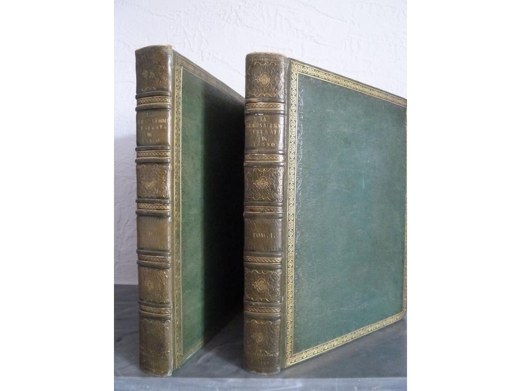 LE TASSE : La Gerusalemme liberata. Seconda ediziona. Paris : Didot lainé, s.d. (1785-1786). 2 volumes in-4°. Reliures légèrement postérieures plein maroquin vert, dos à 5 double nerfs richement et finement ornés de fleurons, et roulettes à froid et dorés, titres et tomaisons dorés, roulette dorée et à froid ne encadrement des plats, filet doré sur coupes et chasses, toutes tranches dorées. Texte en italien. Financé par Monsieur, Frère du Roi, Comte de Provence, il est illustré orné dun frontispice et de 40 gravures hors-texte de COCHIN gravés par Dambrun, De Launay, Delignon, etc. Tiré à seulement 200 ex. (Cohen : 976. Michel :  Charles Nicolas Cochin et le livre illustré au XVIIIe siècle, n°178 : « Cest par son prix, son commanditaire, ses collaborateurs, la faiblesse de son tirage, un des livres le plus luxueux du XVIIIe siècle  »). Ex-libris armorié de Courcol. Dos plus foncés, quelques rousseurs et quelques feuillets légèrement brunis sinon BEL EXEMPLAIRE, superbement illustré par Cochin. Beau tirage des saisissantes gravures